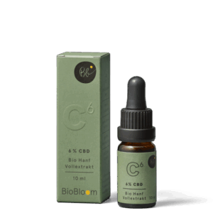 CBD Öl in glasflasche mit Pipette mit grünem Etikett und grüner Außen Verpackung