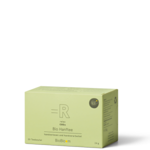 Verpackung CBD Bio Hanftee mit 20 Teebeuteln vor schwarzem Hintergrund.