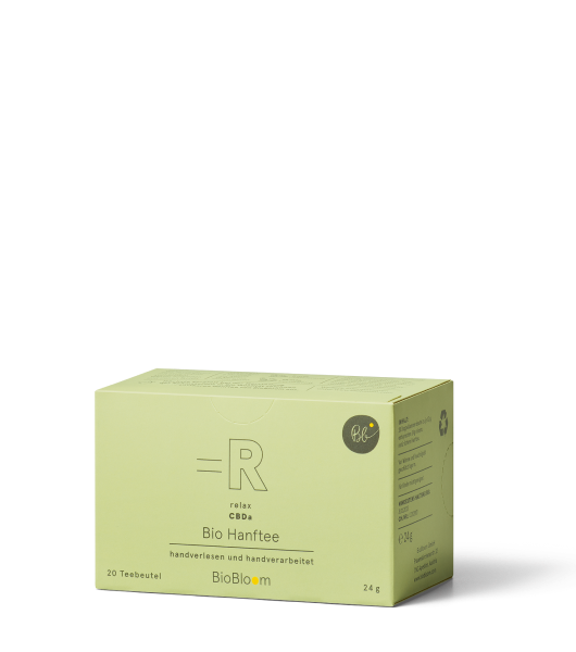 Verpackung CBD Bio Hanftee mit 20 Teebeuteln vor schwarzem Hintergrund.