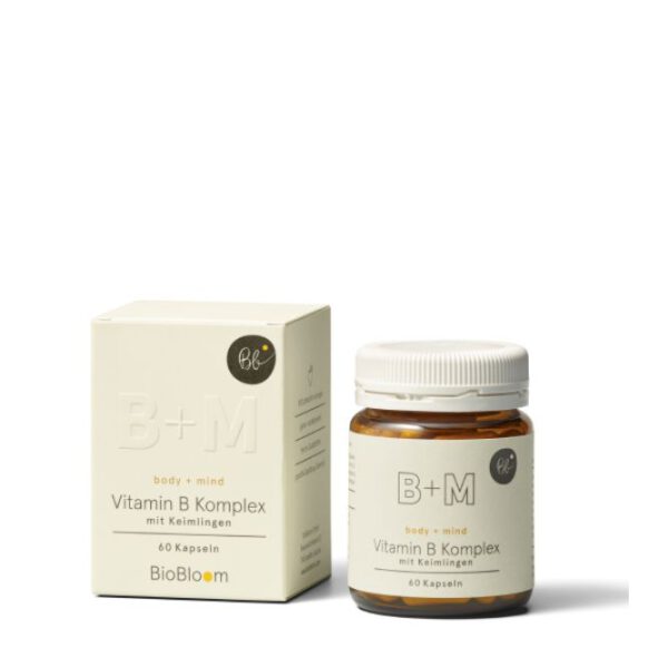 Vitamin B Komplex mit Keimlingen von BioBloom in Glasdose und Verpackung.